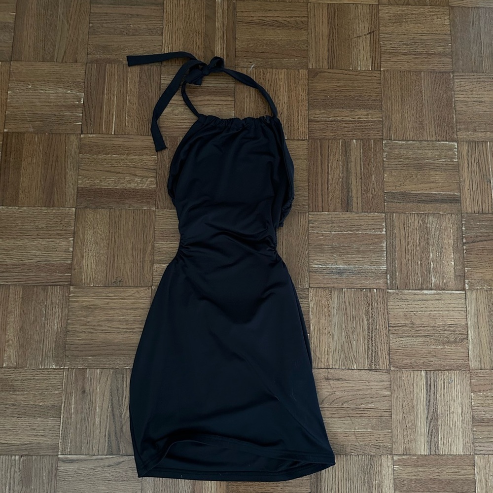 Beginning Boutique black mini dress with side cut outs / size 4 (8 in Euro)